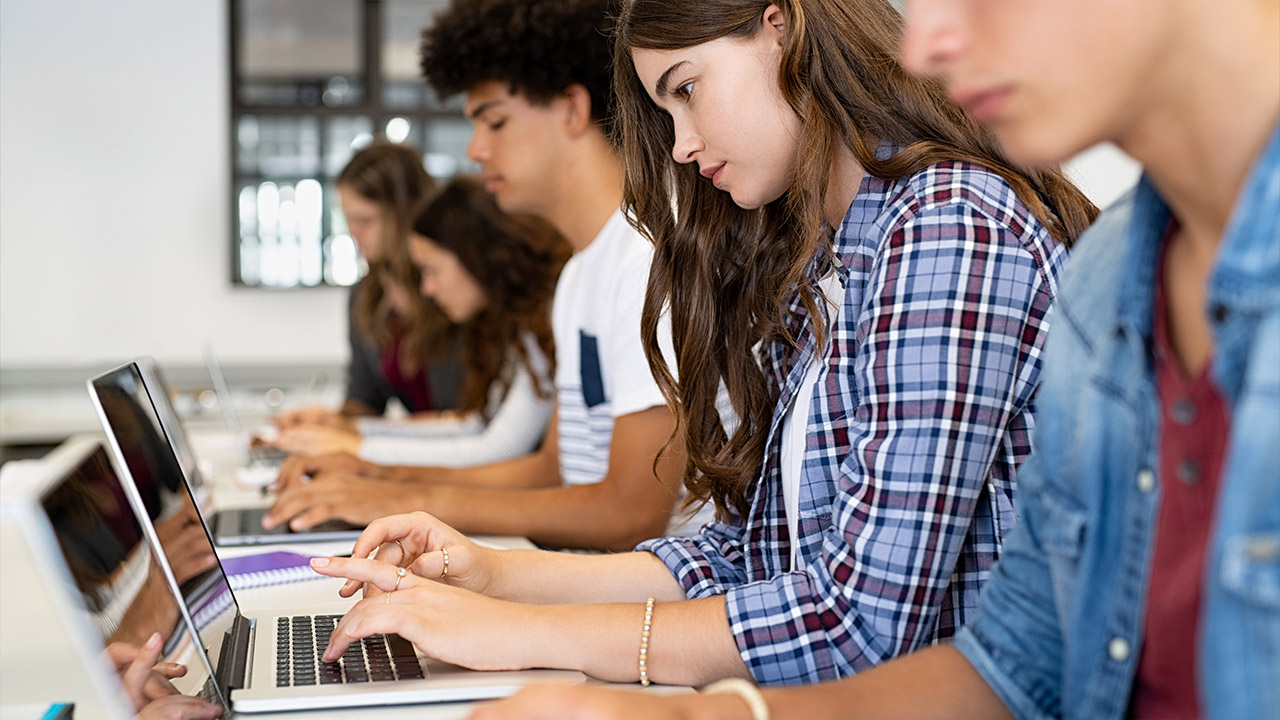university class, students with laptops